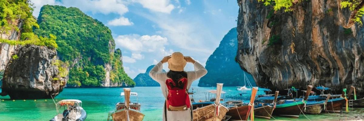 Indian traveller exploring Thailand without a visa, enjoying scenic view